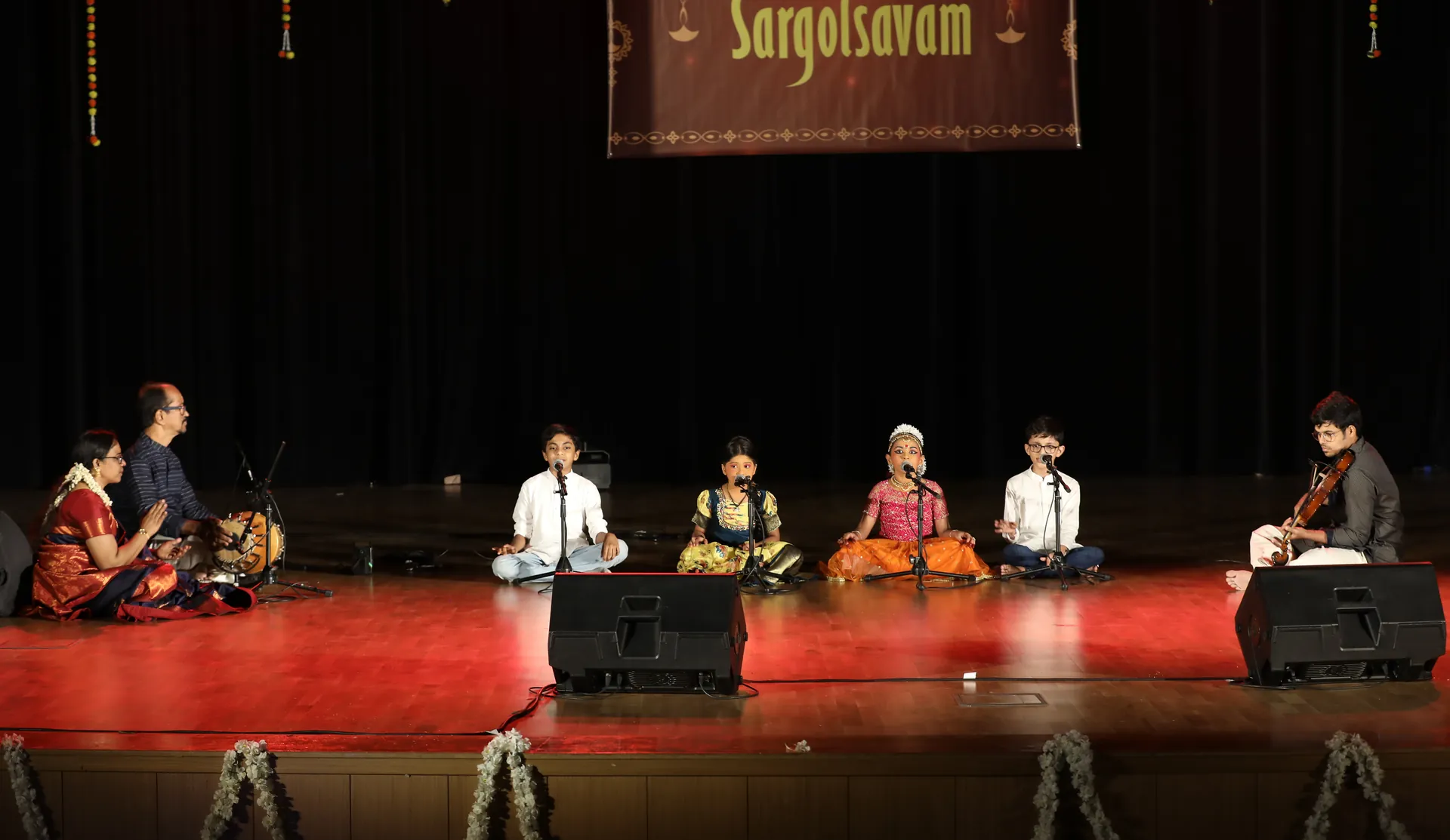 Carnatic music kacheri stage performance by Kairali students